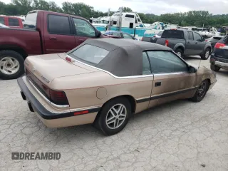 1988 Chrysler LeBaron z VIN 1C3XJ45K9JG438476, wystawiony jako Copart lot #55567334 z przebiegiem 213 424 mil mil oraz Szkoda całkowita • Salvage title. Historia ofert i sprzedaży dostępna na DreamBid. Obrazek 3.