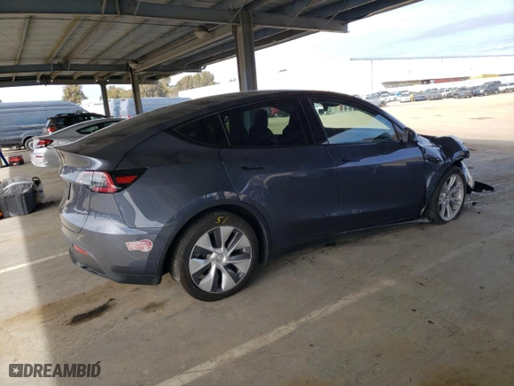 2023 Tesla Model Y Long Range with VIN 7SAYGDEEXPA137582, listed as a Copart auction lot 46869265 with 16,474 mi miles and Salvage Title. Bid and sale history available at carsss.com. Image 3.