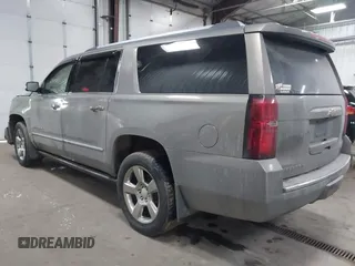 2018 Chevrolet Suburban Premier z VIN 1GNSKJKC9JR100134, wystawiony jako IAAI lot #41449255 z przebiegiem 111 528 mil mil oraz . Historia ofert i sprzedaży dostępna na DreamBid. Obrazek 3.