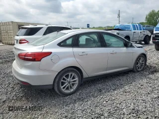 2018 Ford Focus SE z VIN 1FADP3F27JL250591, wystawiony jako Copart lot #54989245 z przebiegiem 85 838 mil mil oraz Szkoda całkowita • Salvage title. Historia ofert i sprzedaży dostępna na DreamBid. Obrazek 3.