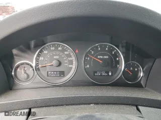 2009 Jeep Grand Cherokee Laredo with VIN 1J8GR48K79C537213, listed as a Copart auction lot 51222395 with 148,838 mi miles and Salvage Title. Bid and sale history available at carsss.com. Image 9.