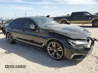 2020 BMW 5 Series M550i xDrive z VIN WBAJS7C01LCD23365, wystawiony jako Copart lot #49166705 z przebiegiem 42 293 mil mil oraz Szkoda całkowita • Salvage title. Historia ofert i sprzedaży dostępna na DreamBid. Obrazek 4.