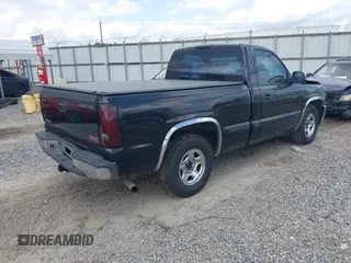 1999 GMC New Sierra 1500 SL with VIN 1GTEC14W2XZ512494, listed as a IAAI auction lot 41799076 with 210,710 mi miles. Bid and sale history available at carsss.com. Image 4.
