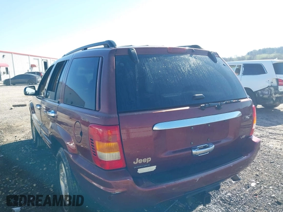 1999 Jeep Grand Cherokee Limited with VIN 1J4GW68N3XC770468, listed as a IAAI auction lot 41793600 with 65,277 mi miles. Bid and sale history available at carsss.com. Image 3.