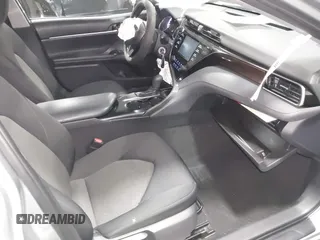 2019 Toyota Camry LE z VIN 4T1B11HK5KU814007, wystawiony jako IAAI lot #42099677 z przebiegiem 91 779 mil mil oraz . Historia ofert i sprzedaży dostępna na DreamBid. Obrazek 5.