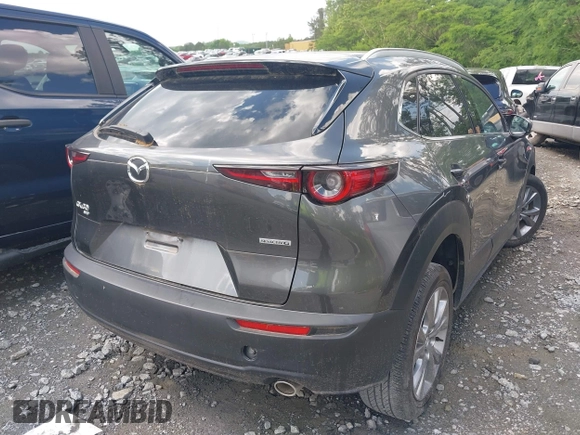 2023 Mazda CX-30 S Premium with VIN 3MVDMBDM2PM526974, listed as a IAAI auction lot 42155416 with 22,428 mi miles and . Bid and sale history available at carsss.com. Image 4.