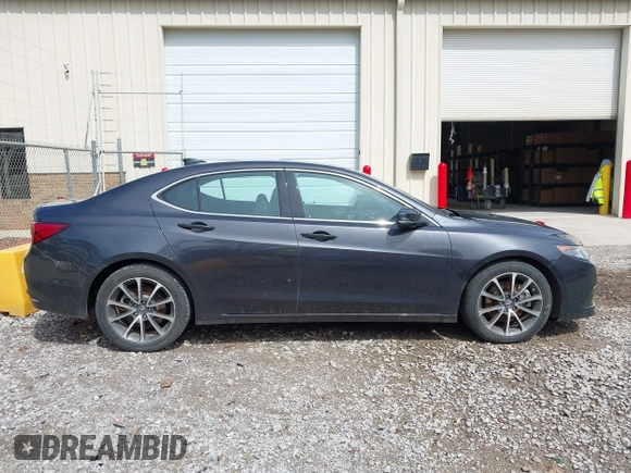 2015 Acura TLX Technology with VIN 19UUB2F56FA001958, listed as a IAAI auction lot 42104640 with 61,572 mi miles and . Bid and sale history available at DreamBid. Image 14.
