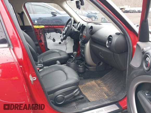 2013 MINI Cooper Countryman with VIN WMWZB3C57DWM07565, listed as a IAAI auction lot 41655938 with 62,694 mi miles. Bid and sale history available at carsss.com. Image 5.