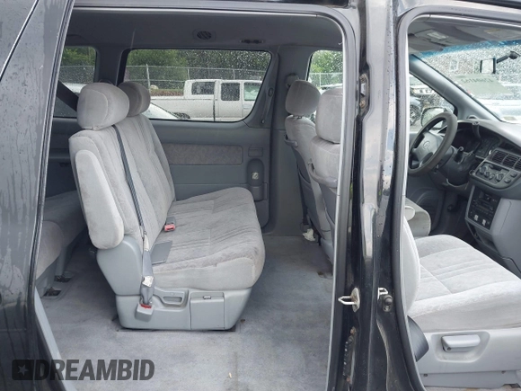 1998 Toyota Sienna LE with VIN 4T3ZF13C6WU016001, listed as a IAAI auction lot 42604162 with 214,491 mi miles and . Bid and sale history available at DreamBid. Image 8.
