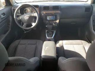 2009 Hummer H3 SUV with VIN 5GTEN13E198105741, listed as a Copart auction lot 51068174 with 172,685 mi miles and Salvage Title. Bid and sale history available at DreamBid. Image 8.