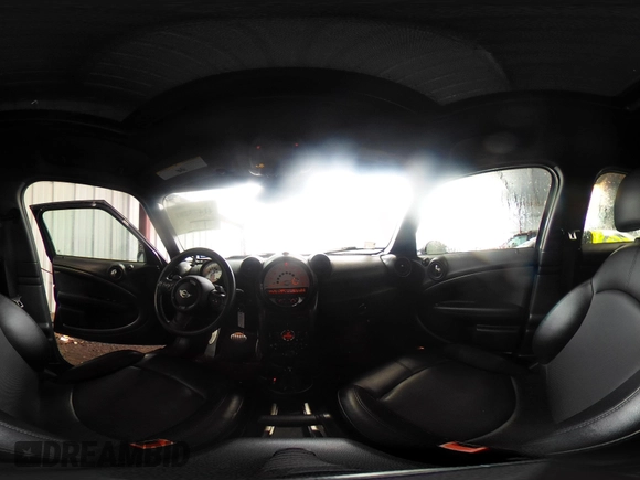 2014 MINI Countryman S with VIN WMWZC5C53EWP40677, listed as a IAAI auction lot 41473281 with 108,616 mi miles and . Bid and sale history available at DreamBid. Image 18.