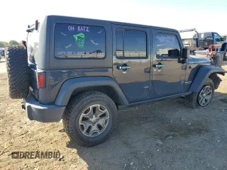 2018 Jeep Wrangler JK Unlimited Rubicon with VIN 1C4BJWFG9JL840582, listed as a Copart auction lot 73064054 with 47,590 mi miles and Salvage Title. Bid and sale history available at carsss.com. Image 3.