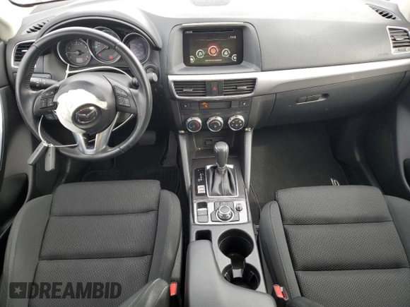 2016 Mazda CX-5 Touring with VIN JM3KE2CYXG0777715, listed as a Copart auction lot 52157005 with 58,585 mi miles and Salvage Title. Bid and sale history available at carsss.com. Image 8.