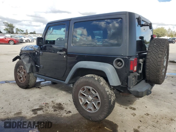 2016 Jeep Wrangler Rubicon with VIN 1C4BJWCG3GL162649, listed as a Copart auction lot 86327414 with 131,407 mi miles and Salvage title. Bid and sale history available at DreamBid. Image 2.