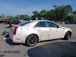 2009 Cadillac CTS RWD z VIN 1G6DF577190106800, wystawiony jako IAAI lot #42316470 z przebiegiem 147 836 mil mil oraz . Historia ofert i sprzedaży dostępna na DreamBid. Obrazek 14.