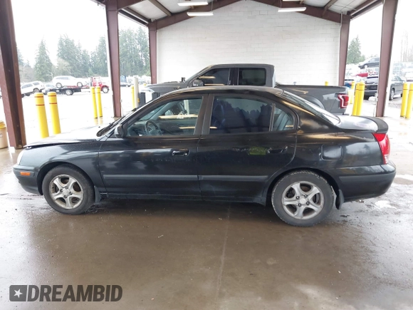 2005 Hyundai Elantra GLS z VIN KMHDN46D15U949573, wystawiony jako IAAI lot #41870209 z przebiegiem 175 819 mil mil oraz . Historia ofert i sprzedaży dostępna na DreamBid. Obrazek 14.