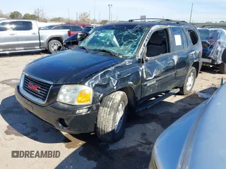 2003 GMC Envoy SLE with VIN 1GKDS13S732134354, listed as a IAAI auction lot 41305506 with 221,733 mi miles. Bid and sale history available at carsss.com. Image 17.