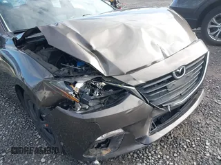 2016 Mazda 3 i Sport with VIN JM1BM1T7XG1298654, listed as a IAAI auction lot 41946415 with 114,894 mi miles and . Bid and sale history available at carsss.com. Image 6.