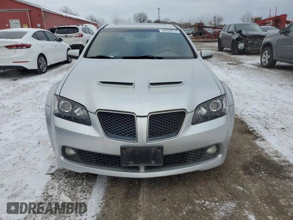 2009 Pontiac G8 z VIN 6G2ER57729L223218, wystawiony jako Copart lot #84234214 z przebiegiem 222 165 mil mil oraz Szkoda całkowita • Salvage title. Historia ofert i sprzedaży dostępna na DreamBid. Obrazek 5.