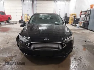 2018 Ford Fusion SE z VIN 3FA6P0LU3JR203864, wystawiony jako IAAI lot #41476335 z przebiegiem 49 246 mil mil oraz . Historia ofert i sprzedaży dostępna na DreamBid. Obrazek 12.