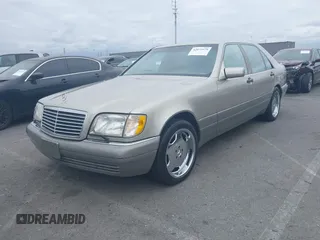 1996 Mercedes-Benz S with VIN WDBGA57E8TA318326, listed as a IAAI auction lot 42072979 with 97,504 mi miles and . Bid and sale history available at DreamBid. Image 2.