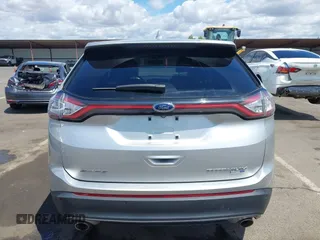 2015 Ford Edge Titanium z VIN 2FMTK4K95FBB47962, wystawiony jako IAAI lot #42234894 z przebiegiem Nie podano mil oraz . Historia ofert i sprzedaży dostępna na DreamBid. Obrazek 16.