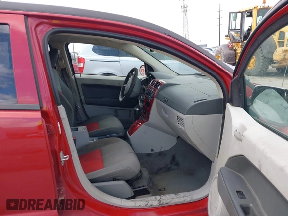 2007 Dodge Caliber SXT with VIN 1B3HB48B07D351411, listed as a IAAI auction lot 41908669 with 152,176 mi miles and . Bid and sale history available at DreamBid. Image 5.