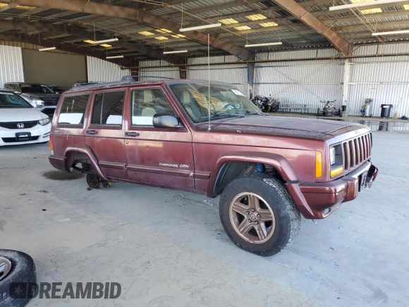 2000 Jeep Cherokee Classic with VIN 1J4FF58S8YL135534, listed as a Copart auction lot 62211335 with 108,888 mi miles and Salvage title. Bid and sale history available at DreamBid. Image 4.