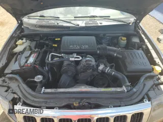 2000 Jeep Grand Cherokee Laredo z VIN 1J4GW48N0YC210235, wystawiony jako Copart lot #60558905 z przebiegiem 131 108 mil mil oraz Szkoda całkowita • Salvage title. Historia ofert i sprzedaży dostępna na DreamBid. Obrazek 12.