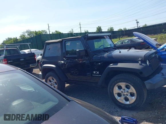 2009 Jeep Wrangler X with VIN 1J4FA24179L711352, listed as a IAAI auction lot 42577898 with 133,309 mi miles and . Bid and sale history available at DreamBid. Image 13.