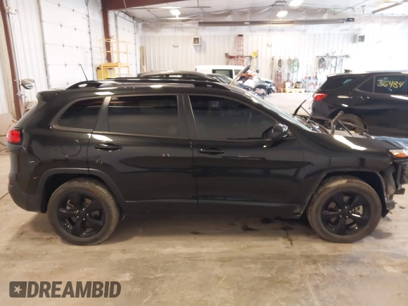2016 Jeep Cherokee Latitude with VIN 1C4PJMCS6GW214045, listed as a IAAI auction lot 42440361 with 115,863 mi miles and . Bid and sale history available at DreamBid. Image 13.