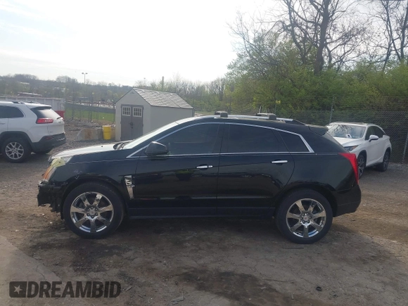 2012 Cadillac SRX Premium Collection with VIN 3GYFNFE34CS614896, listed as a IAAI auction lot 41987735 with 93,972 mi miles and . Bid and sale history available at DreamBid. Image 14.