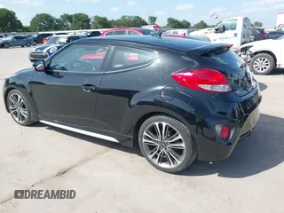 2016 Hyundai Veloster Turbo z VIN KMHTC6AE7GU255020, wystawiony jako IAAI lot #42720287 z przebiegiem 89 629 mil mil oraz . Historia ofert i sprzedaży dostępna na DreamBid. Obrazek 3.