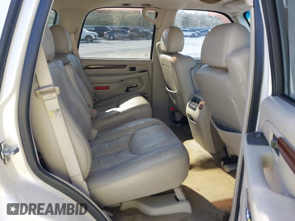 2004 Cadillac Escalade с VIN 1GYEC63TX4R299594, выставлен на аукционе IAAI как лот 41833184 с пробегом 320 822 миль миль и . История ставок и продаж доступна на DreamBid. Изображение 8.