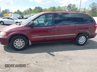 2001 Dodge Caravan Sport with VIN 2B4GP44371R357363, listed as a IAAI auction lot 42051708 with 127,352 mi miles and . Bid and sale history available at carsss.com. Image 6.
