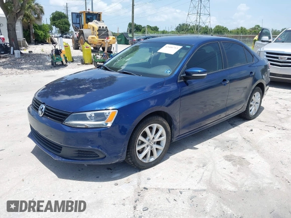 2011 Volkswagen Jetta SE with VIN 3VWDX7AJ2BM013231, listed as a IAAI auction lot 42400713 with 117,923 mi miles and . Bid and sale history available at DreamBid. Image 2.