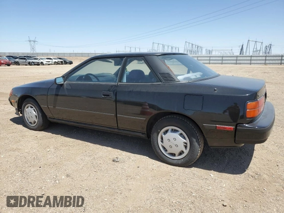 1989 Toyota Celica z VIN JT2ST67C8K7337876, wystawiony jako Copart lot #57918785 z przebiegiem 16 862 mil mil oraz Tytuł czysty. Historia ofert i sprzedaży dostępna na DreamBid. Obrazek 2.