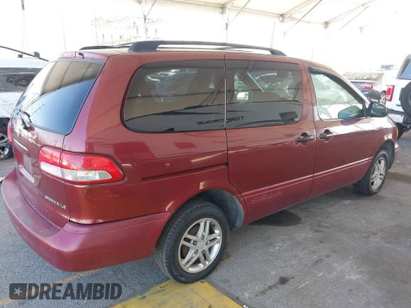 2002 Toyota Sienna LE with VIN 4T3ZF13C02U473719, listed as a IAAI auction lot 42272685 with 301,288 mi miles and . Bid and sale history available at DreamBid. Image 4.