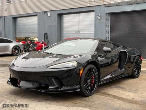 2023 McLaren GT with VIN SBM22GCA3PW002548, listed as a Copart auction lot 52157855 with 779 mi miles and Salvage Title. Bid and sale history available at carsss.com. Image 12.