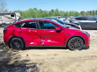 2022 Tesla Model Y Performance with VIN 7SAYGDEFXNF513951, listed as a IAAI auction lot 41986001 with 37,225 mi miles and . Bid and sale history available at DreamBid. Image 12.