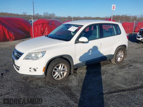 2011 Volkswagen Tiguan SEL with VIN WVGBV7AX7BW515233, listed as a IAAI auction lot 41234933 with 170,674 mi miles and . Bid and sale history available at DreamBid. Image 2.
