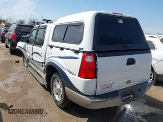 2002 Ford Explorer Sport Trac Value z VIN 1FMZU77E42UC81703, wystawiony jako IAAI lot #42091104 z przebiegiem 232 563 mil mil oraz . Historia ofert i sprzedaży dostępna na DreamBid. Obrazek 3.