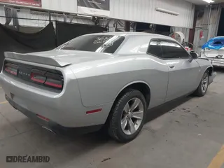 2021 Dodge Challenger SXT with VIN 2C3CDZAG8MH630713, listed as a IAAI auction lot 41825990 with 67,603 mi miles. Bid and sale history available at carsss.com. Image 4.