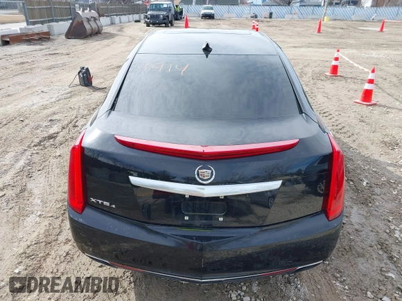 2015 Cadillac XTS Luxury z VIN 2G61N5S35F9155543, wystawiony jako IAAI lot #41699914 z przebiegiem 120 700 mil mil oraz . Historia ofert i sprzedaży dostępna na DreamBid. Obrazek 17.