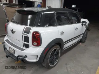 2015 MINI Countryman S with VIN WMWZC5C53FWT37722, listed as a IAAI auction lot 42151891 with 110,488 mi miles and . Bid and sale history available at DreamBid. Image 4.