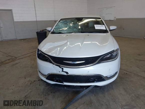 2015 Chrysler 200 C z VIN 1C3CCCEG9FN573670, wystawiony jako IAAI lot #41918086 z przebiegiem 260 656 mil mil oraz . Historia ofert i sprzedaży dostępna na DreamBid. Obrazek 13.