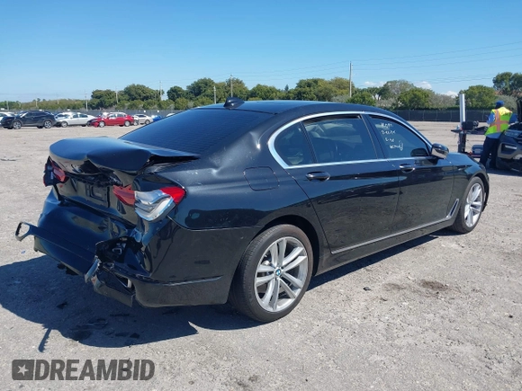 2018 BMW 7 Series 750i with VIN WBA7F0C54JGM22900, listed as a IAAI auction lot 41673673 with 66,264 mi miles. Bid and sale history available at carsss.com. Image 4.