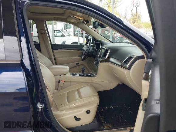 2014 Jeep Grand Cherokee Limited with VIN 1C4RJFBG4EC347208, listed as a IAAI auction lot 41982209 with 124,663 mi miles and . Bid and sale history available at DreamBid. Image 5.
