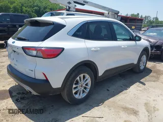 2020 Ford Escape SE z VIN 1FMCU9G63LUA85246, wystawiony jako IAAI lot #42414015 z przebiegiem 54 578 mil mil oraz . Historia ofert i sprzedaży dostępna na DreamBid. Obrazek 4.