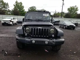 2017 Jeep Wrangler Unlimited Sport with VIN 1C4BJWDG7HL747010, listed as a Copart auction lot 64274405 with 61,602 mi miles and Salvage title. Bid and sale history available at DreamBid. Image 13.
